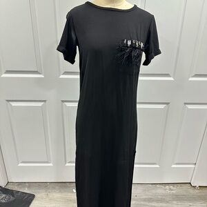 Elegant Black Dress with Feather Detail